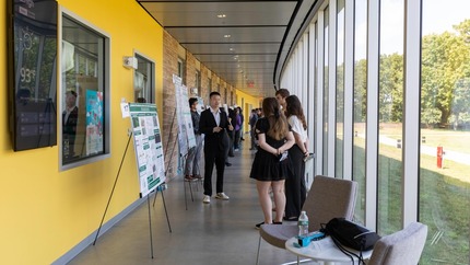Students presenting research on Mountaintop.